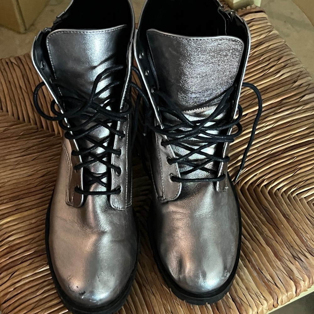 Size 8.5. Silver combat boot by dolce vita.